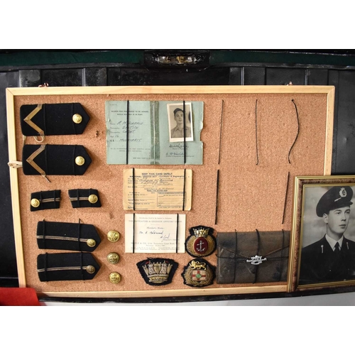 99 - A group of militaria relating to A.M Diarmid of the Merchant Navy, to include a metal travelling tru... 