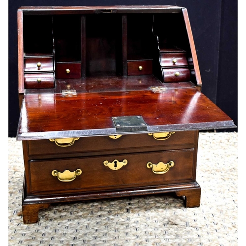A fine George III period mahogany apprentice bureau, circa 1790 with a ...