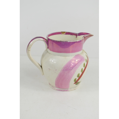 29 - A 19th century Sunderland lustre jug; 'A West Street View of the Iron Bridge at Sunderland Built by ... 