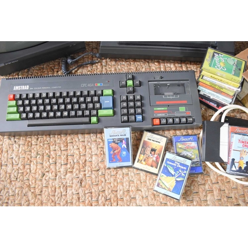 A vintage Amstrad CPC 464 personal computer together with an Amstrad ...
