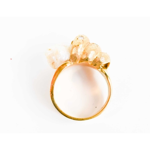 14 - An 18ct gold, pearl, diamond and emerald ring, in the form of a shell with large freshwater pearl to... 