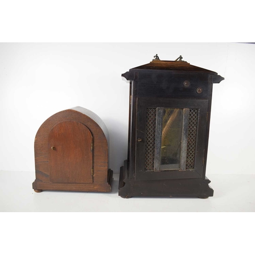 215 - An early 20th century oak cased Westminster chime bracket clock by Kienzle with pendulum and key, 42... 