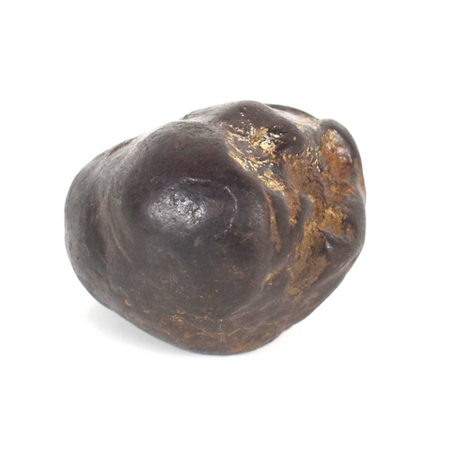 242 - A mineral specimen, possibly Meteorite, found by the vendor in a field near Penny Stratford whilst m... 