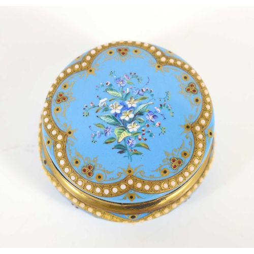 261 - A 19th century, likely French blue enamel pill box, handpainted with floral motifs in white blue and... 