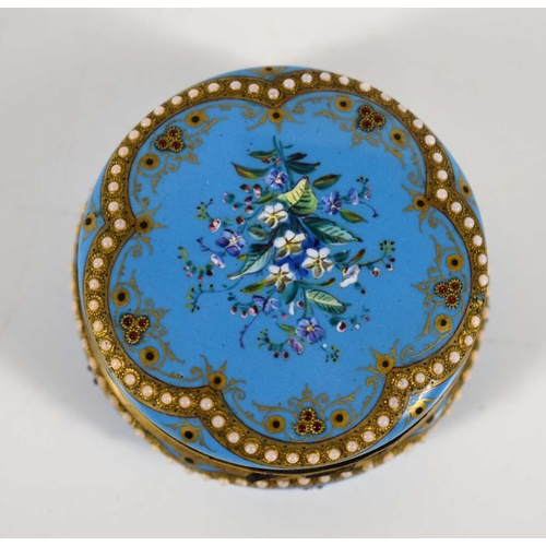 261 - A 19th century, likely French blue enamel pill box, handpainted with floral motifs in white blue and... 