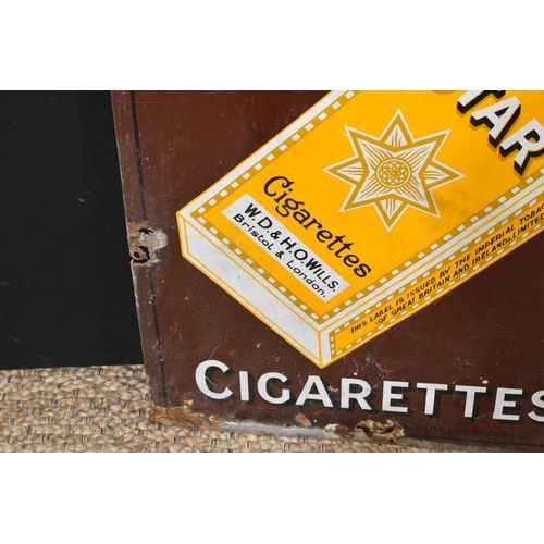 27 - Enamel signs: A vintage Will's Star Cigarettes enamel advertising sign, 91.5cm by 61cm.