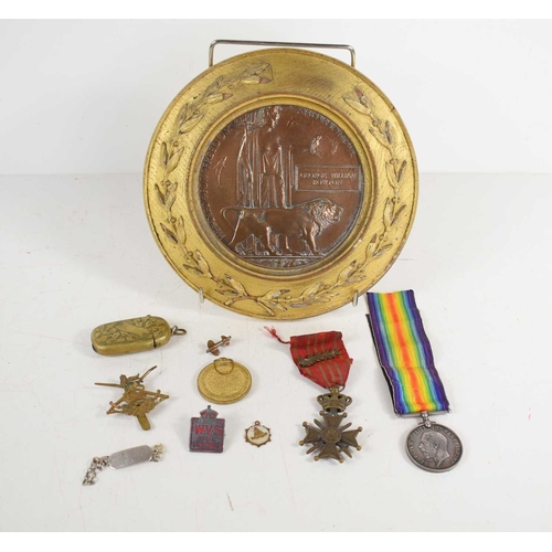 289 - A group of militaria to include a framed WWI death penny for George William Rowton, a 1914-1918 war ... 