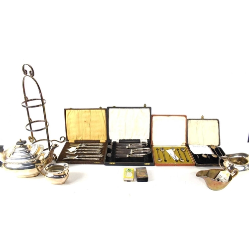 330 - A group of silver and silver plate to include two sets of silver coffee spoons, a silver match box h... 