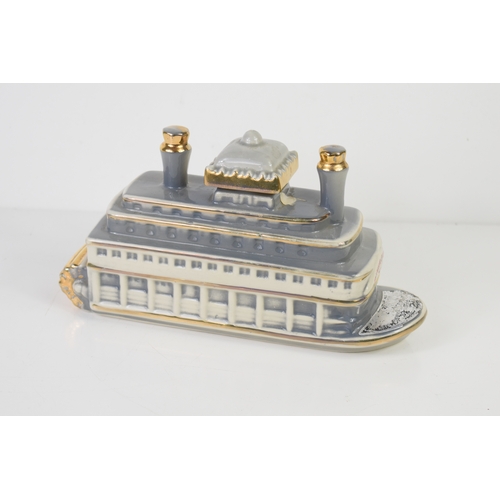 210a - A Paul Lux 1968 Liquor bottle in the form of a riverboat 'River Queen' with original label to the fr... 
