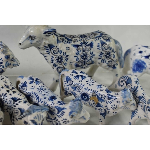 138 - A collection of 19th century and later Delft blue and white tin glazed ceramic animals to include ca... 