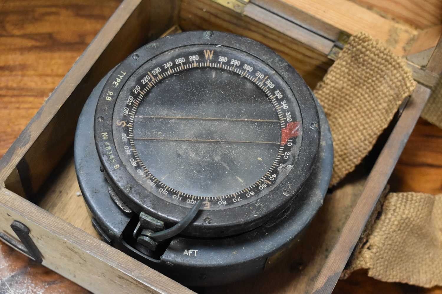 A military issue compass, bearing Admiralty Compass Observatory stamps ...