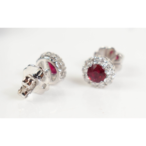 A pair of 18ct white gold, ruby and diamond cluster stud earrings ...