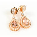 A pair of 18ct gold drop earrings with a pear cut peach morganite ...