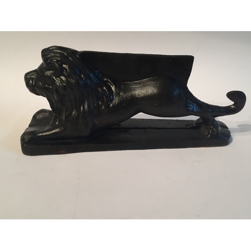 162 - A nice quality cast iron footscrape in form of lion