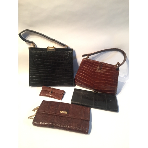 169 - Four good quality animal skin vintage handbags along with an animal skin wallet