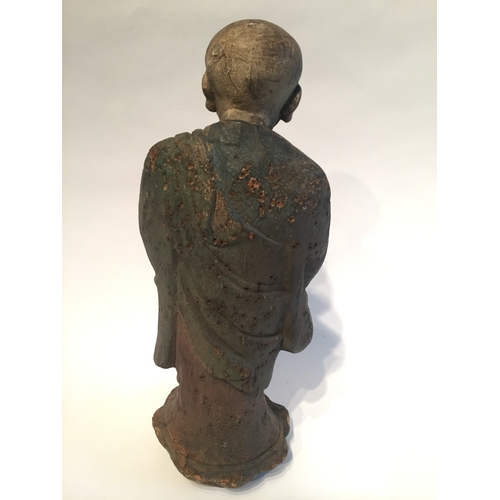 165 - Polychrome Praying Buddhist. Measures 30cm high