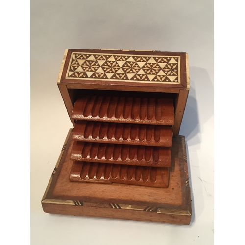 176 - Collectable Bone and mother of pearl Inlaid cigarette box (Some losses)