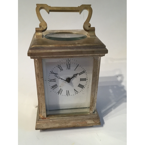 116 - Small Plated Carriage clock measures 8x5cms