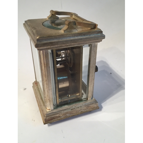 116 - Small Plated Carriage clock measures 8x5cms