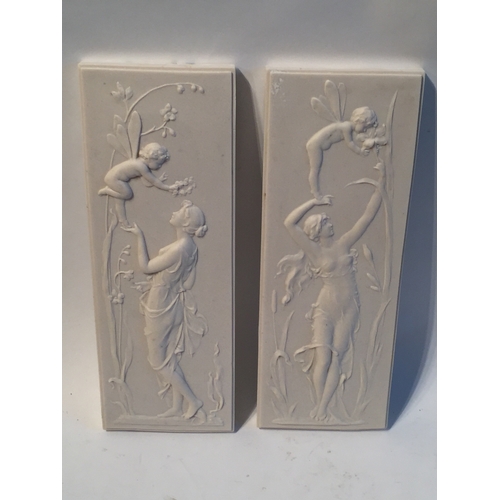 117 - Pair of Marble plaques with Fairy decoration measures 32x12cms