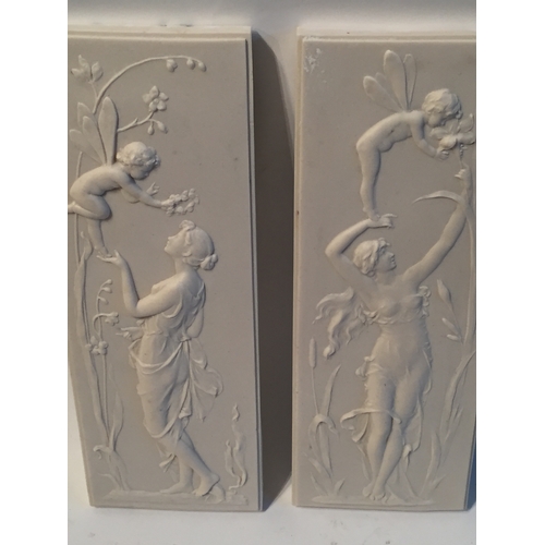 117 - Pair of Marble plaques with Fairy decoration measures 32x12cms