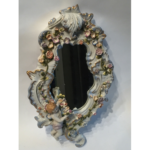 118 - Meissen style Cherub mirror measures 49x28cms