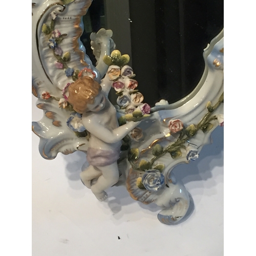 118 - Meissen style Cherub mirror measures 49x28cms