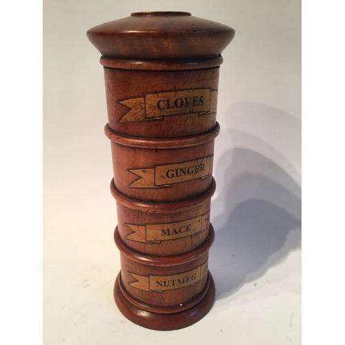 130 - Treen spice tower measures 19cms high