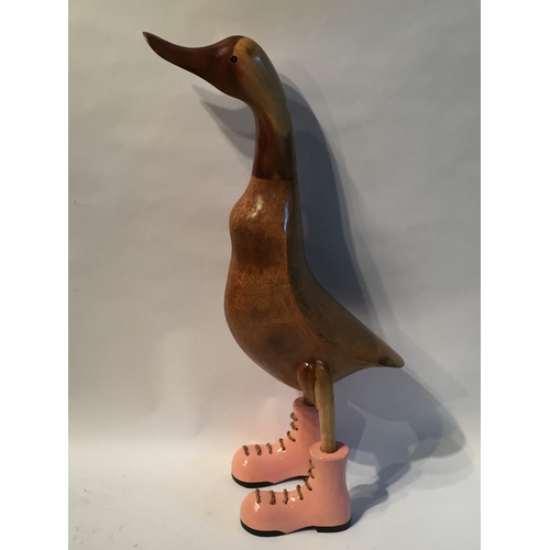 221 - Wood Goose In Pink Boots measures 62cm high