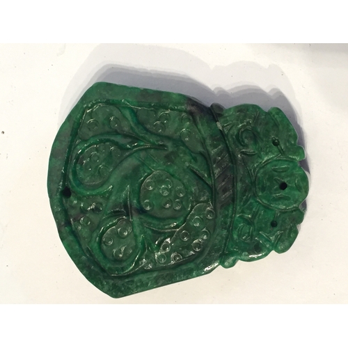 244 - Carved  Jade Pendant measures 5cms