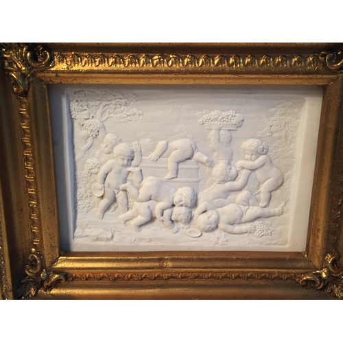 273 - Gilt Frame Marble Plaque Of Cherubs Playing .