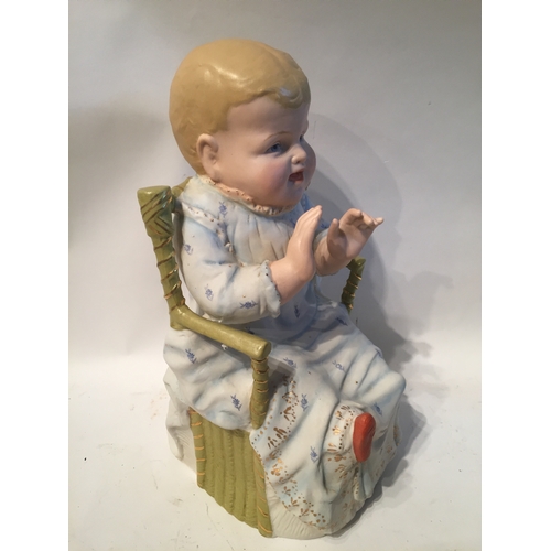 333 - Porcelain  Baby In High Chair With Stamp