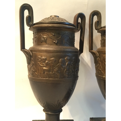 86 - A Pair of 19th C French Bronze Urns With Cherub And Ivy Decoration , a/f .