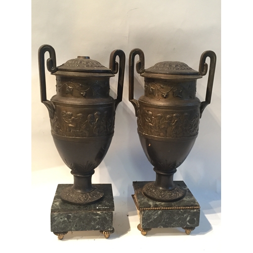 86 - A Pair of 19th C French Bronze Urns With Cherub And Ivy Decoration , a/f .