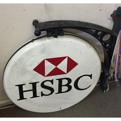 198 - HSBC Double Sided Metal Bank Sign On A Heavy Iron Frame. Measures 85cm x 70cm