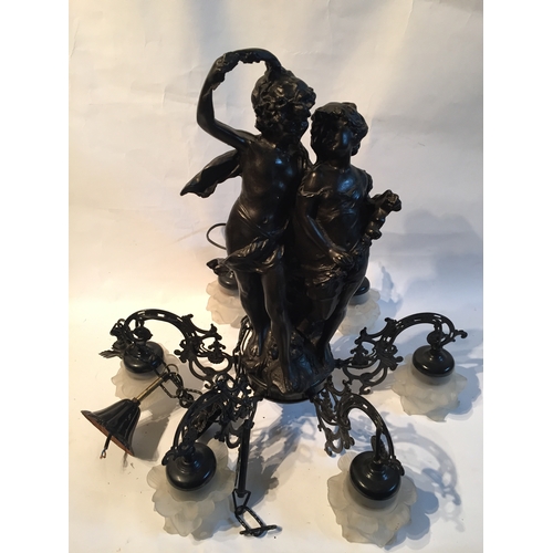 58 - A Cherub Six Branch Chandelier Of Spelter Construction With Two Embracing Cherub Centrepiece.