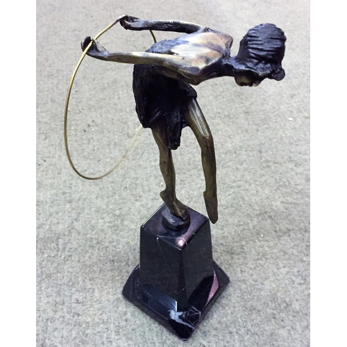 198 - Bronze hula girl on marble base measures 30cm high