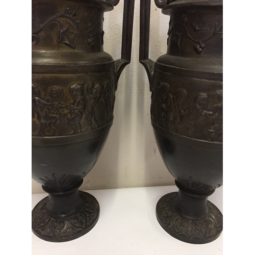 115 - Pair Of  Urns With NeoClassical Decoration Standing 32cms High