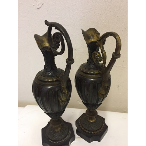 116 - 2 X 19th Century Bronze Ewers Standing 25cms high