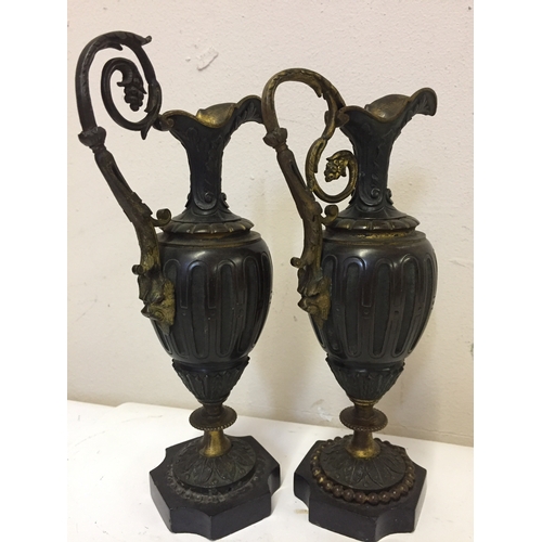 116 - 2 X 19th Century Bronze Ewers Standing 25cms high