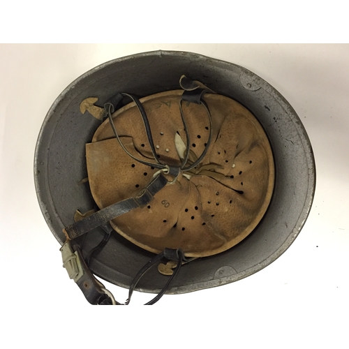 194 - German Military Helmet With Liner.