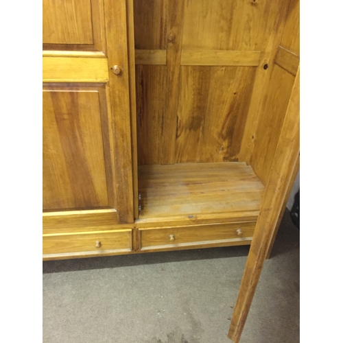 24 - Solid Pine  Wardrobe With Two Lower Drawers. Measures 191 x 163 x 55 cm