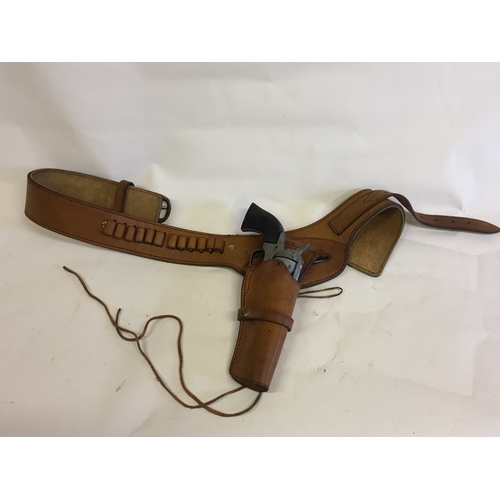 295 - Leather Gun Holster Along With A Western Style Model Action Army 45 Inert Gun.