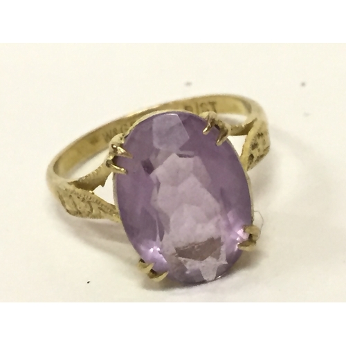 112 - Gold Amethyst Ring Along With Matching Earings