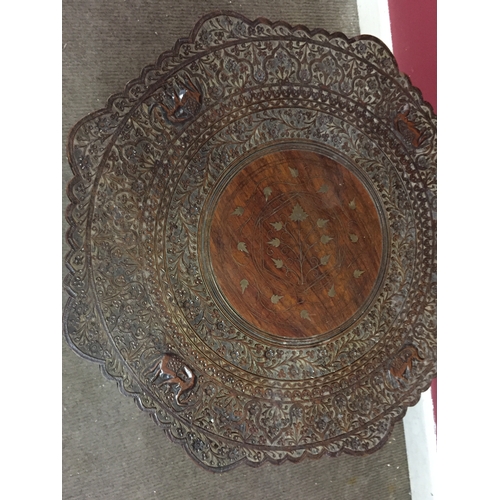 22 - Indian Carved Wood Table Profusely Carved With Elephant Decoration And Floral Inlay top measures 57c... 