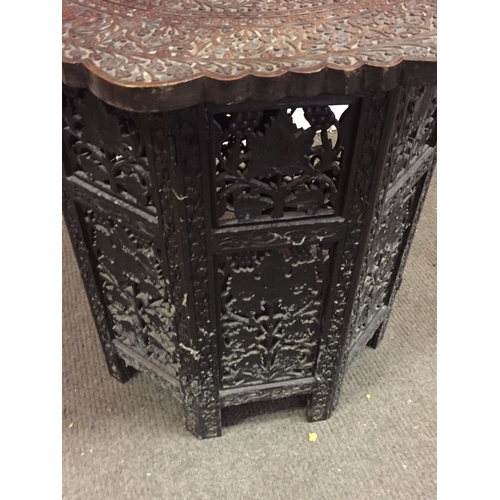 22 - Indian Carved Wood Table Profusely Carved With Elephant Decoration And Floral Inlay top measures 57c... 