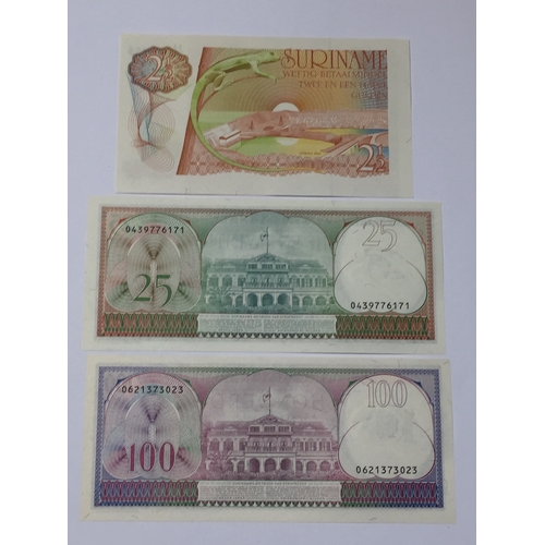 316 - Bank Of Surinam Notes To Include The Pretty 2 1/2 Gulden Note Along With A 25 And 100 Gulden Note Al... 