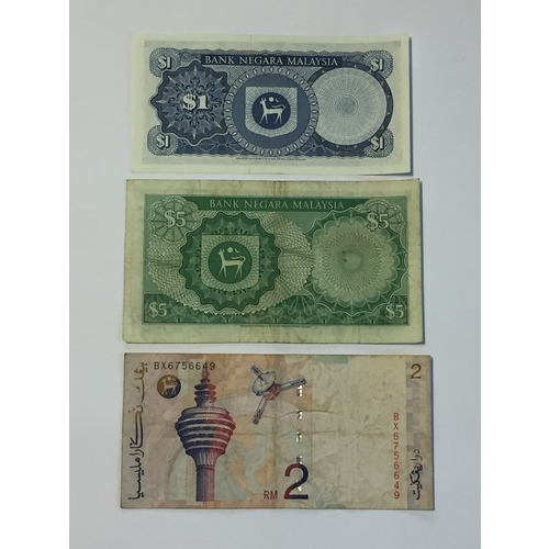 389 - Bank Negara Malaysia Notes To Include 1976 1 Dollar UNC , 1967 5 Dollar VF , Along with A 1997 2 Rin... 