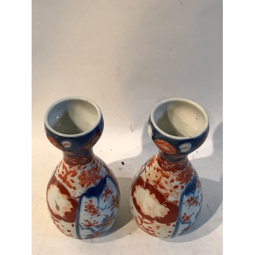 346 - 2 Small Oriental  Spill Vases Measures 19cm Tall