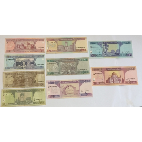 463 - Afghanistan Banknotes to Include 1 , 2 , 5 , 10 , 20 , 50 , 100 , 500 , 1000 Afghanis VF -UNC (9) .